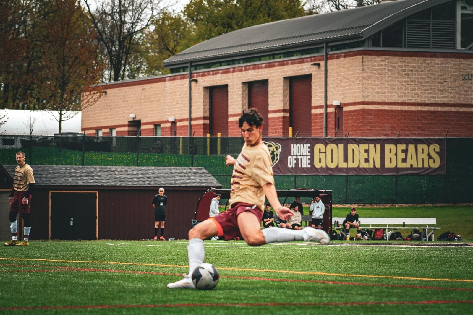 Lucas Cherniak taking a shot during a Kutztown University soccer match.